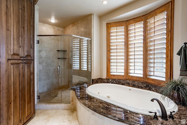 3143 E Bavarian Ct, Cottonwood Heights, UT 84093 - full bath featuring a jetted tub, tile patterned floors, and a stall shower