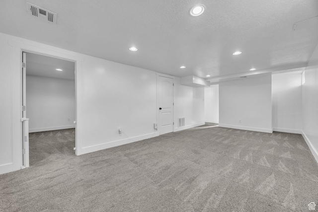 181 E 4300 S, Washington Terrace, UT 84405 - finished below grade area with visible vents, recessed lighting, and carpet flooring