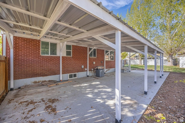 181 E 4300 S, Washington Terrace, UT 84405 - view of patio with fence, an attached carport, and cooling unit