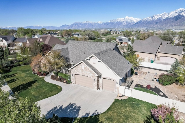 aerial view with a mountain view and a residential view