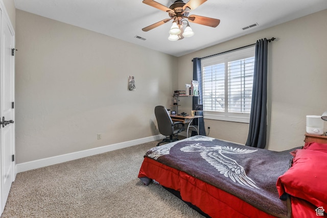 carpeted bedroom with baseboards, visible vents, and ceiling fan