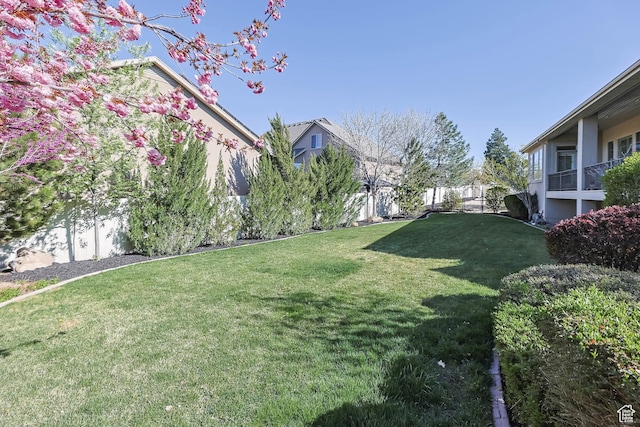 view of yard with fence