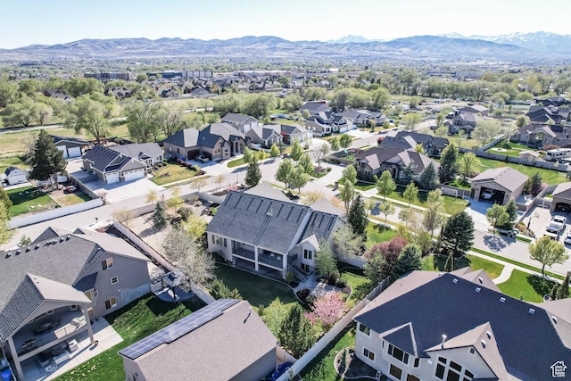 bird's eye view featuring a residential view and a mountain view