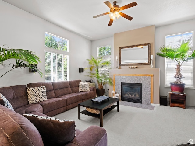 1184 S 1850 E, Spanish Fork, UT 84660 - carpeted living area featuring a fireplace with flush hearth, a ceiling fan, and a healthy amount of sunlight