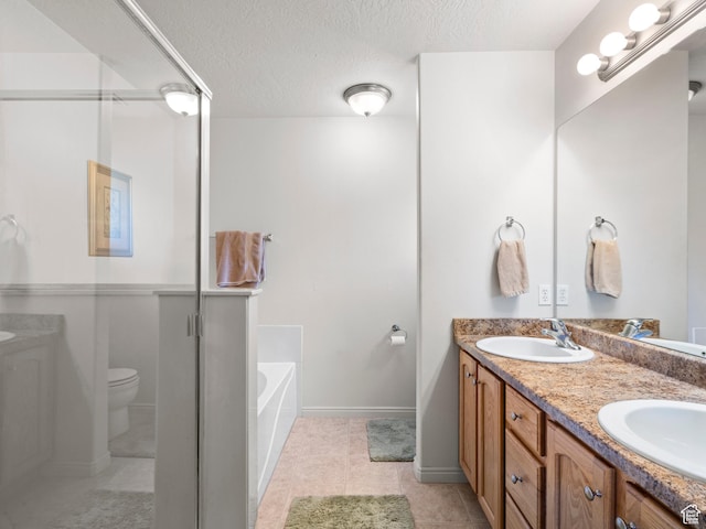 1184 S 1850 E, Spanish Fork, UT 84660 - bathroom featuring a garden tub, a sink, and toilet