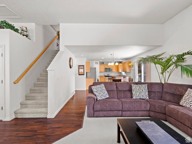 1184 S 1850 E, Spanish Fork, UT 84660 - living area featuring stairs, an inviting chandelier, baseboards, dark wood-type flooring, and recessed lighting
