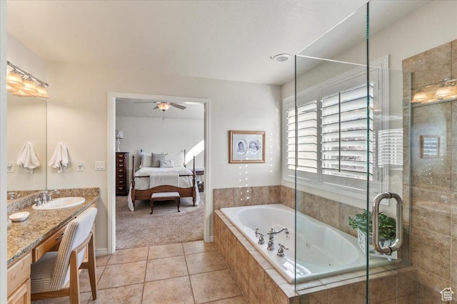 2010 E Rocklin Dr, Sandy, UT 84092 - ensuite bathroom with a shower stall, tile patterned floors, vanity, a jetted tub, and ensuite bath