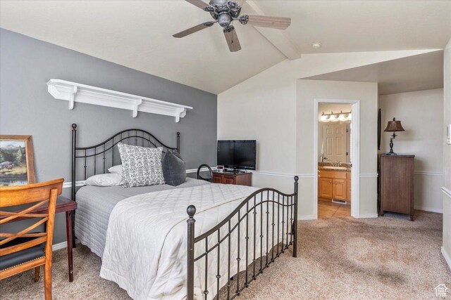 2010 E Rocklin Dr, Sandy, UT 84092 - bedroom with vaulted ceiling with beams, baseboards, light colored carpet, a ceiling fan, and connected bathroom