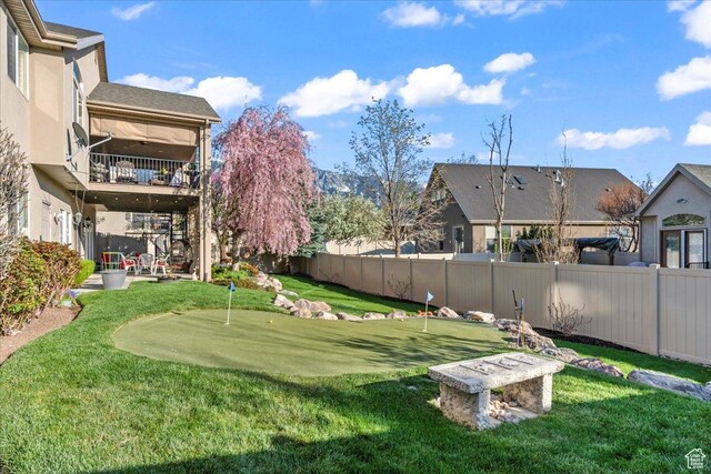 2010 E Rocklin Dr, Sandy, UT 84092 - view of yard featuring a patio area, a fenced backyard, and a balcony