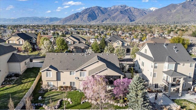 2010 E Rocklin Dr, Sandy, UT 84092 - drone / aerial view with a mountain view and a residential view