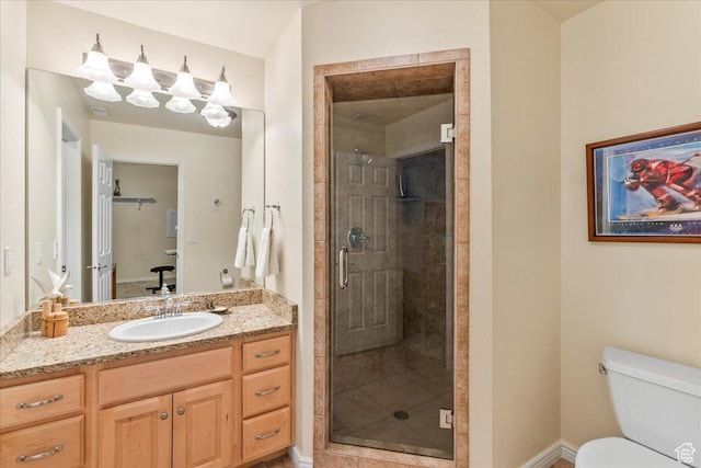 2010 E Rocklin Dr, Sandy, UT 84092 - bathroom featuring toilet, vanity, and a stall shower