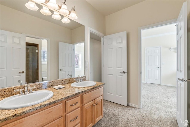 2010 E Rocklin Dr, Sandy, UT 84092 - full bath with double vanity, toilet, walk in shower, and a sink