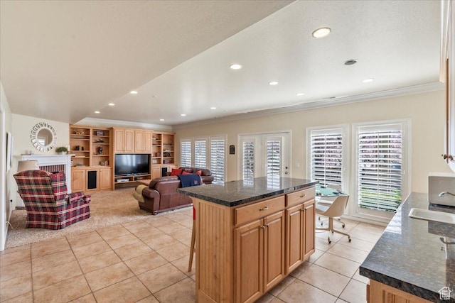2010 E Rocklin Dr, Sandy, UT 84092 - kitchen with a sink, ornamental molding, and light tile patterned floors