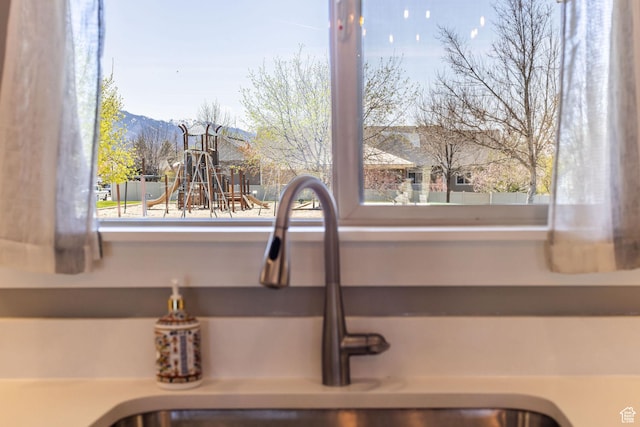 room details featuring a sink and a mountain view