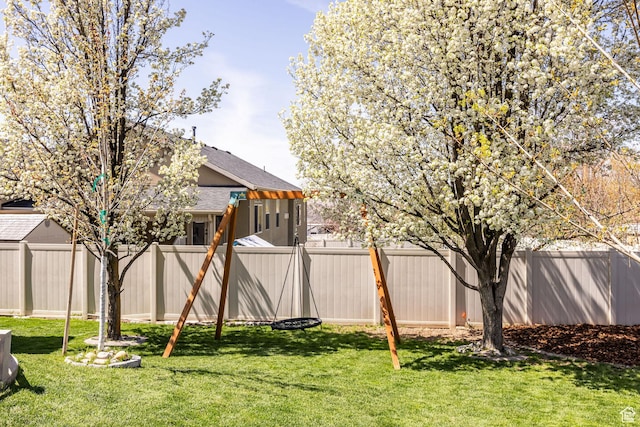 view of yard with a fenced backyard