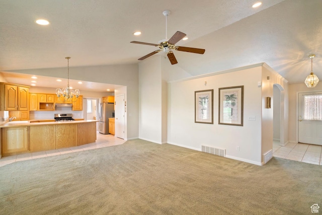 618 W 225 S, Layton, UT 84041 - unfurnished living room featuring recessed lighting, lofted ceiling, visible vents, baseboards, and light colored carpet