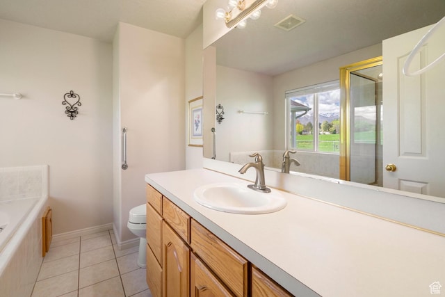 618 W 225 S, Layton, UT 84041 - bathroom featuring tile patterned floors, toilet, visible vents, a tub to relax in, and vanity