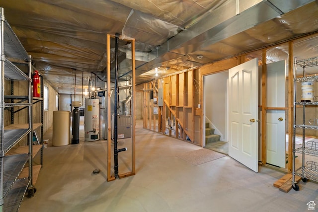 618 W 225 S, Layton, UT 84041 - below grade area with stairs, heating unit, gas water heater, and electric panel