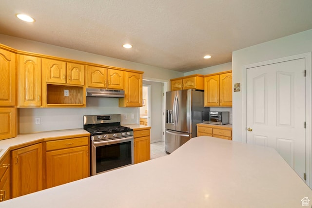 618 W 225 S, Layton, UT 84041 - kitchen with light countertops, under cabinet range hood, recessed lighting, and appliances with stainless steel finishes