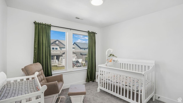12373 S Pedroia St, Herriman, UT 84096 - bedroom featuring carpet flooring, baseboards, and a nursery area