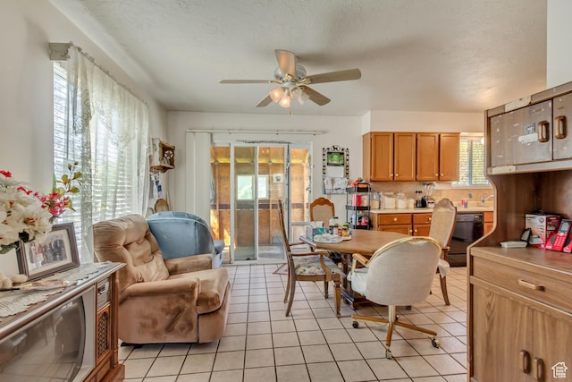 386 W 1125 N, Centerville, UT 84014 - dining room featuring light tile patterned floors, a textured ceiling, and ceiling fan