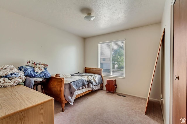 386 W 1125 N, Centerville, UT 84014 - bedroom featuring light carpet, a textured ceiling, and visible vents