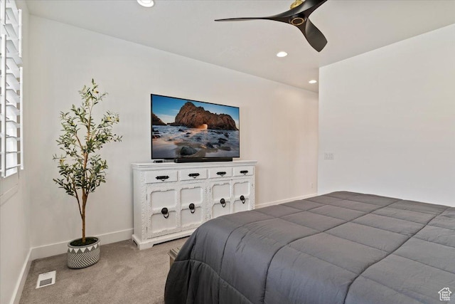 bedroom featuring light colored carpet, baseboards, visible vents, and recessed lighting