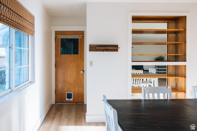 109 S 2nd W, Grace, ID 83241 - interior space featuring baseboards, a healthy amount of sunlight, and wood finished floors