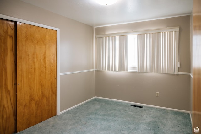 109 S 2nd W, Grace, ID 83241 - unfurnished bedroom with carpet floors, a closet, visible vents, and baseboards