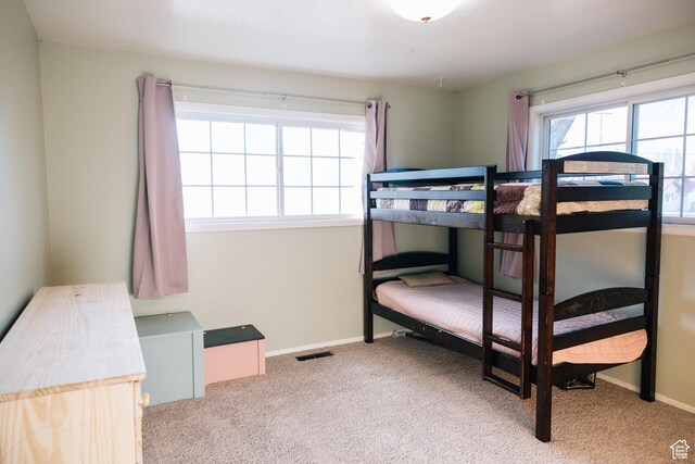 109 S 2nd W, Grace, ID 83241 - bedroom with baseboards, multiple windows, and carpet