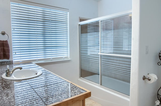 1896 N Main St, Orem, UT 84057 - bathroom with shower / bath combination with glass door and a sink