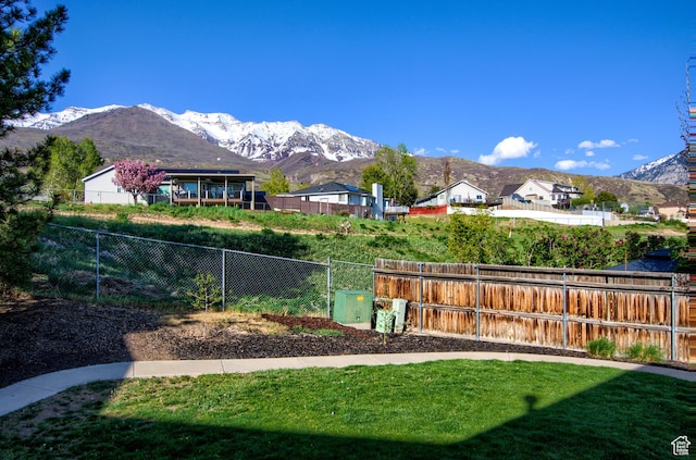 1896 N Main St, Orem, UT 84057 - view of yard with fence, a mountain view, and a residential view