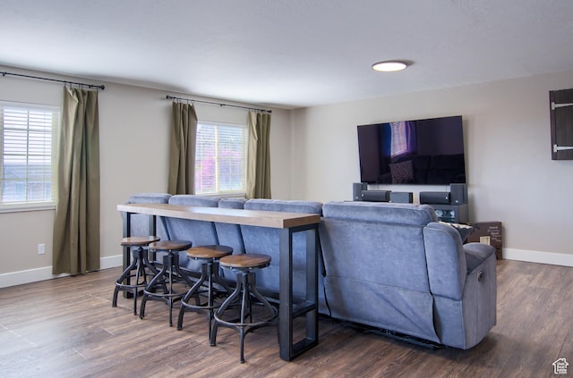 1896 N Main St, Orem, UT 84057 - living room with baseboards, dark wood-style flooring, and a healthy amount of sunlight