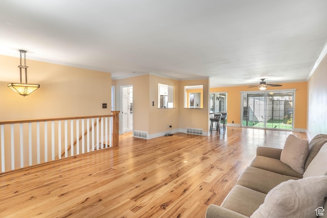 287 E 4640 N, Provo, UT 84604 - living room with ceiling fan, ornamental molding, light wood-style floors, and visible vents