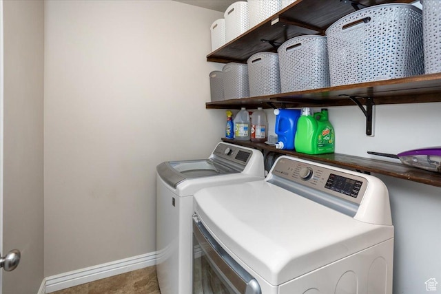 4206 Rose Springs Rd, Erda, UT 84074 - laundry area with washer and clothes dryer and baseboards