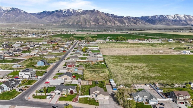 4206 Rose Springs Rd, Erda, UT 84074 - aerial overview of property's location with mountains and nearby suburban area
