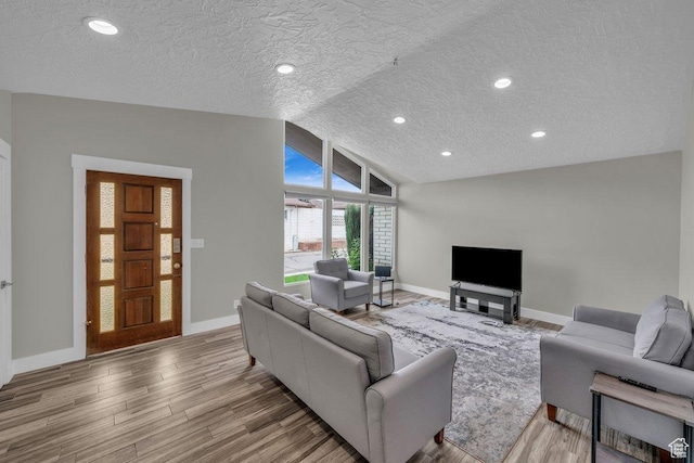 living room with light wood finished floors and baseboards