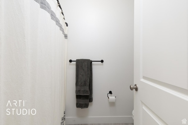 bathroom with baseboards