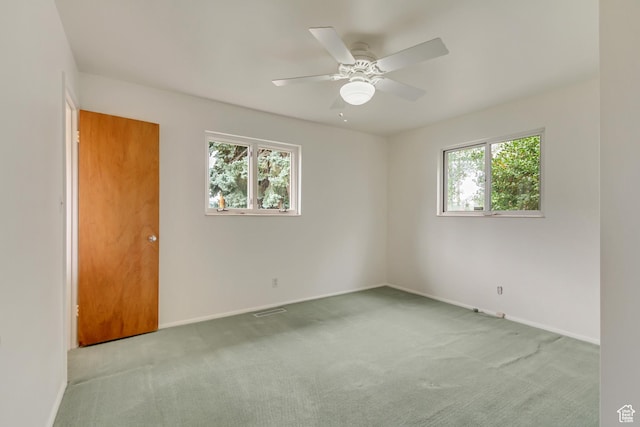 2344 E Arnett Dr, Millcreek, UT 84109 - carpeted empty room featuring baseboards, a ceiling fan, and visible vents