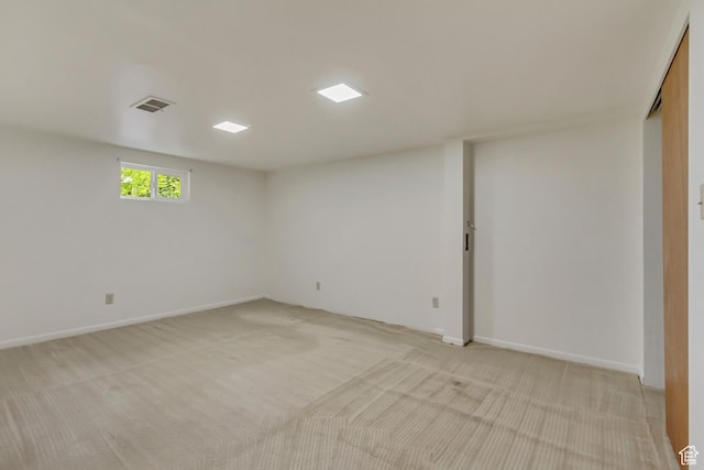 2344 E Arnett Dr, Millcreek, UT 84109 - below grade area featuring baseboards, visible vents, and light colored carpet