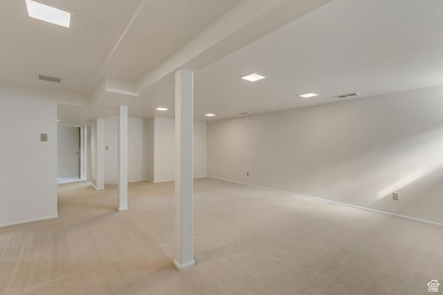 2344 E Arnett Dr, Millcreek, UT 84109 - finished basement featuring light carpet, baseboards, visible vents, and recessed lighting
