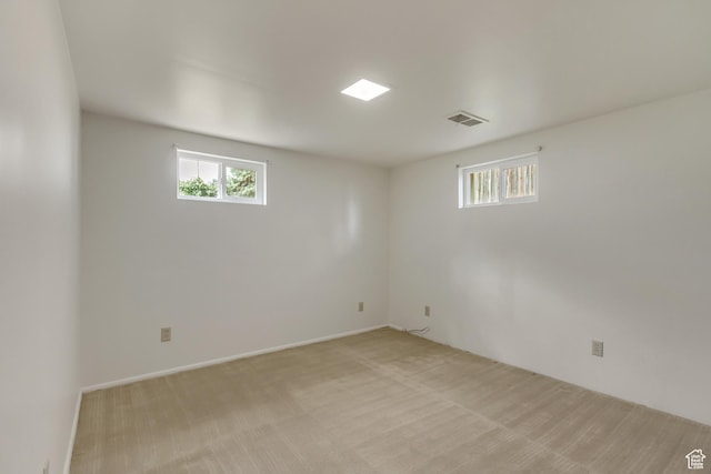 2344 E Arnett Dr, Millcreek, UT 84109 - basement featuring light carpet and visible vents