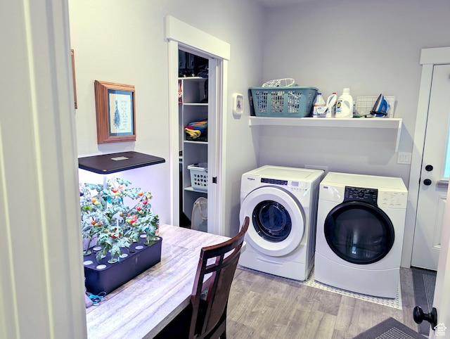 627 W Olympic Ln, Elk Ridge, UT 84651 - laundry area with wood finished floors, washer and dryer, and laundry area