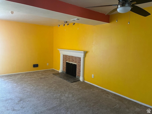 416 E Creekside Cir Unit C, Murray, UT 84107 - unfurnished living room with visible vents, a brick fireplace, baseboards, ceiling fan, and carpet flooring