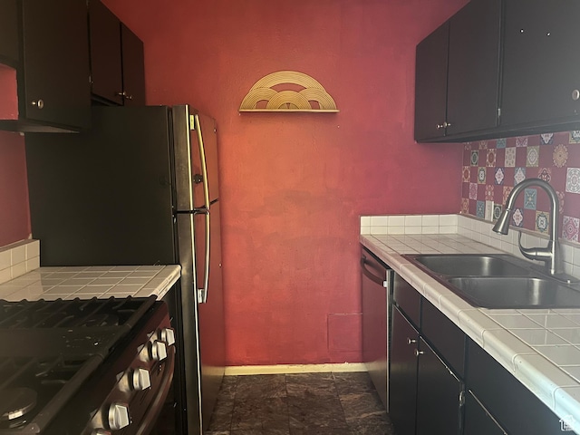 416 E Creekside Cir Unit C, Murray, UT 84107 - kitchen with tile counters, a sink, baseboards, and stainless steel appliances