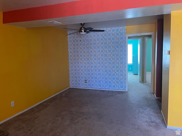 416 E Creekside Cir Unit C, Murray, UT 84107 - spare room with baseboards, a ceiling fan, carpet flooring, and visible vents