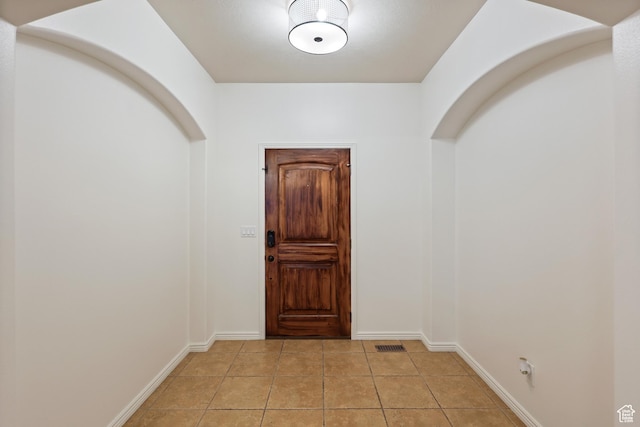 9226 N Mount Airey Dr W, Eagle Mountain, UT 84005 - foyer entrance with light tile patterned floors and baseboards
