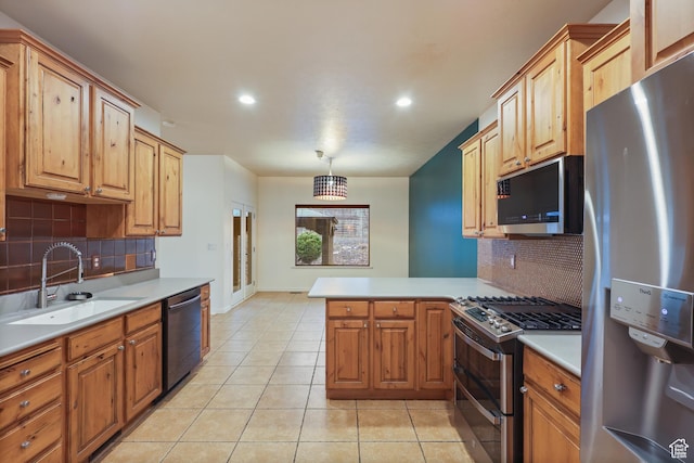 9226 N Mount Airey Dr W, Eagle Mountain, UT 84005 - kitchen featuring stainless steel appliances, a sink, light tile patterned floors, tasteful backsplash, and a peninsula