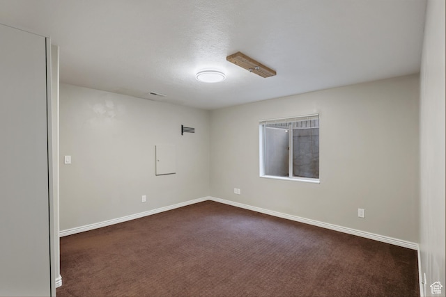 9226 N Mount Airey Dr W, Eagle Mountain, UT 84005 - spare room featuring dark carpet and baseboards