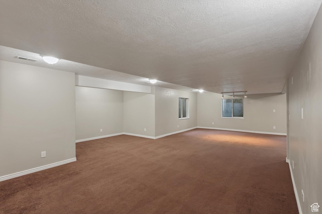 9226 N Mount Airey Dr W, Eagle Mountain, UT 84005 - finished below grade area featuring carpet, baseboards, and a textured ceiling
